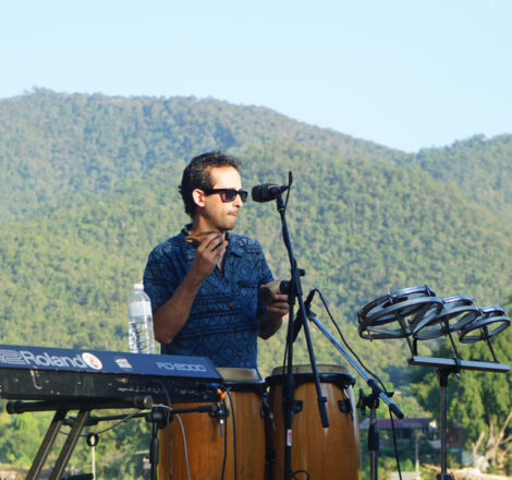 Giorgio Cortiana playing percussion in a live setting