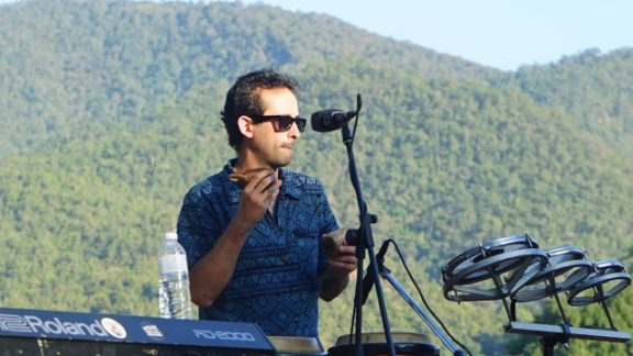 Giorgio Cortiana playing percussion in a live setting